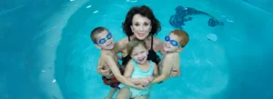 Lana Whitehead, founder of SWIMkids USA, teaches kids how to swim
