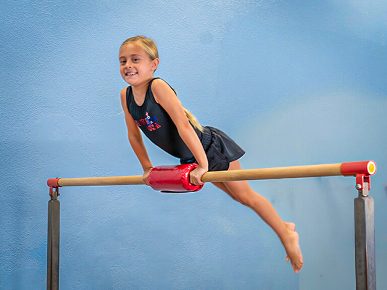 Advanced student practicing back handsprings during a kids tumbling class in Mesa