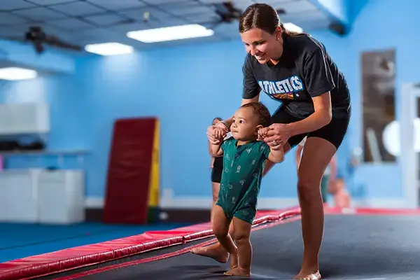 Teaching gym lessons to a happy child
